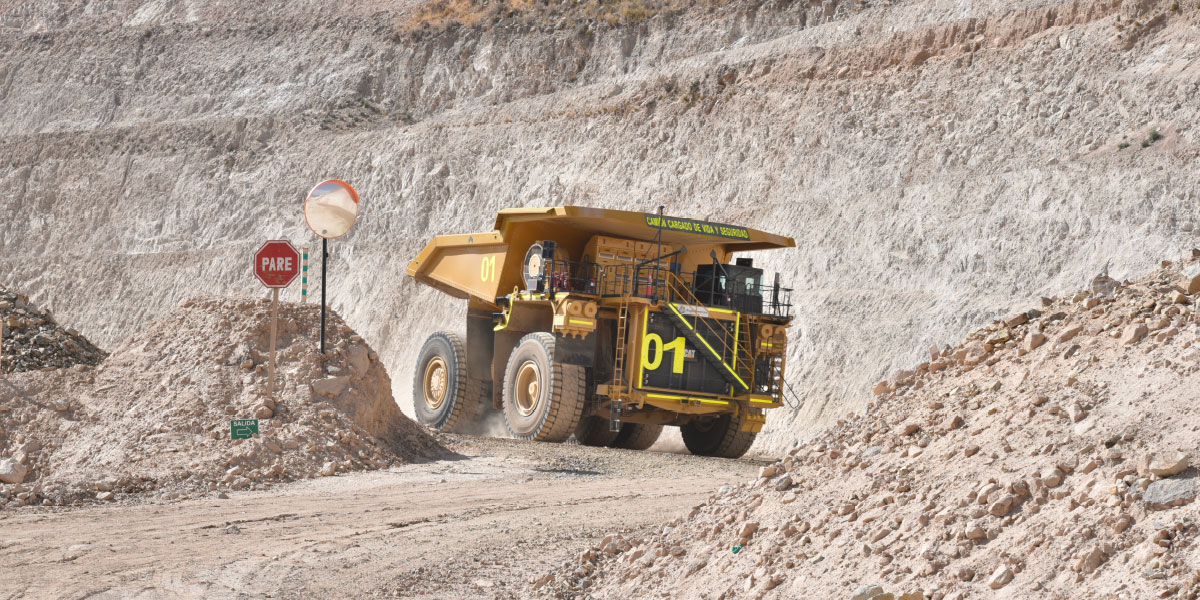 Heavy truck going through the field