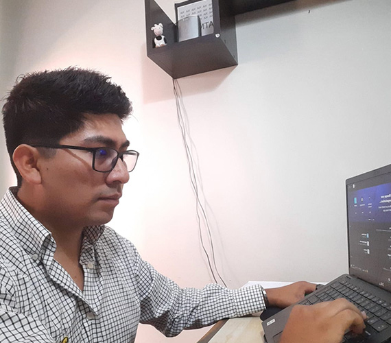 Men working on laptop