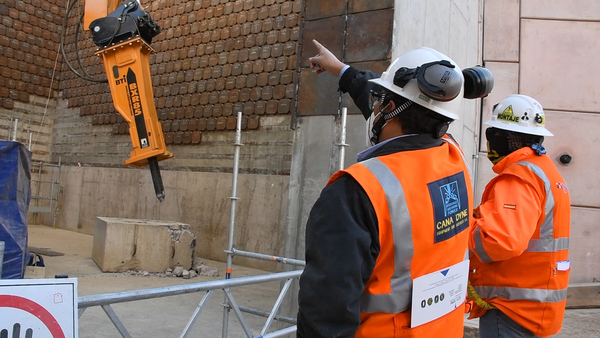 Two people working